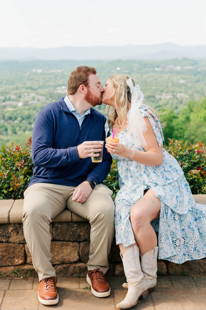 James and Hannah Brooke embracing just after the proposal